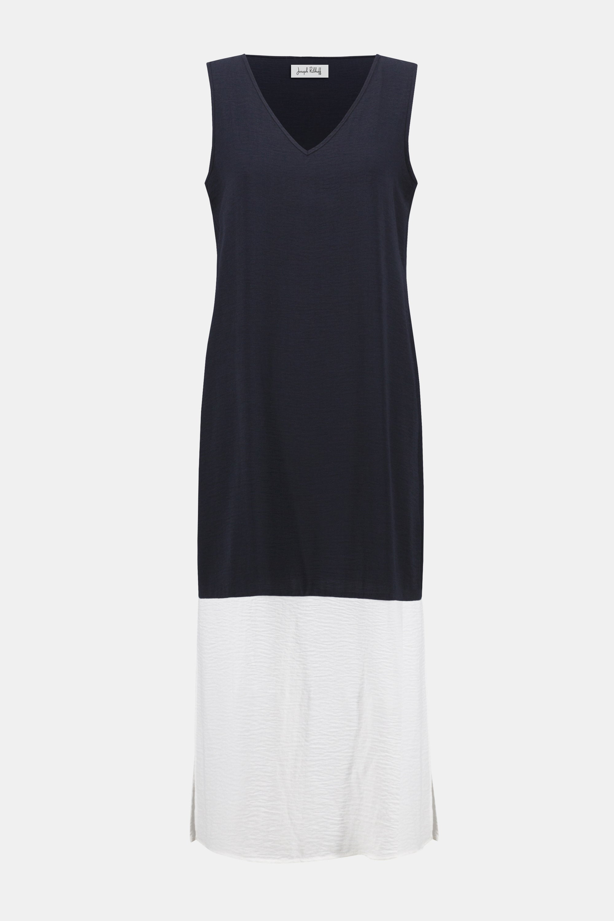 Sleeveless midi dress with a navy upper bodice and contrasting white lower skirt, featuring a subtle V-neckline and a straight silhouette.
