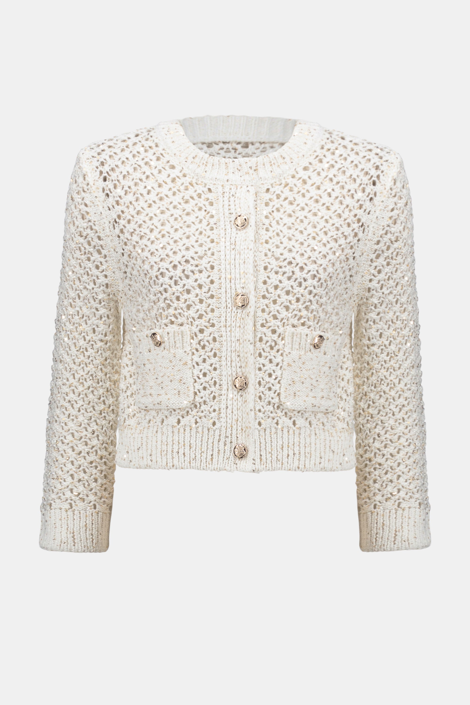Flat lay of cream chenille open stitch cardigan with round gold buttons and front patch pockets.
