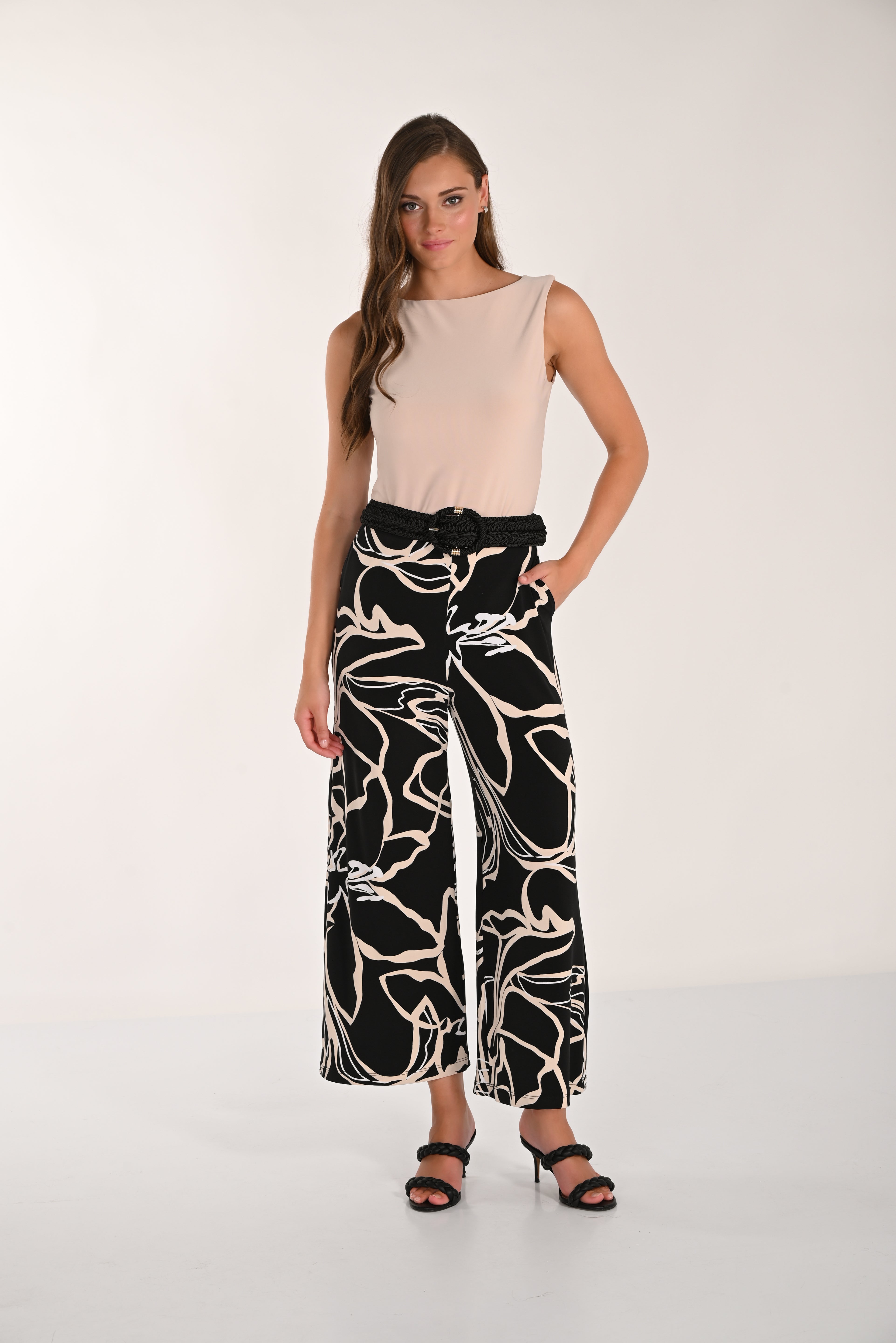 Model wearing the Avenue Wide-Leg Pant with a sleeveless fitted top, woven statement belt, and braided heeled sandals.