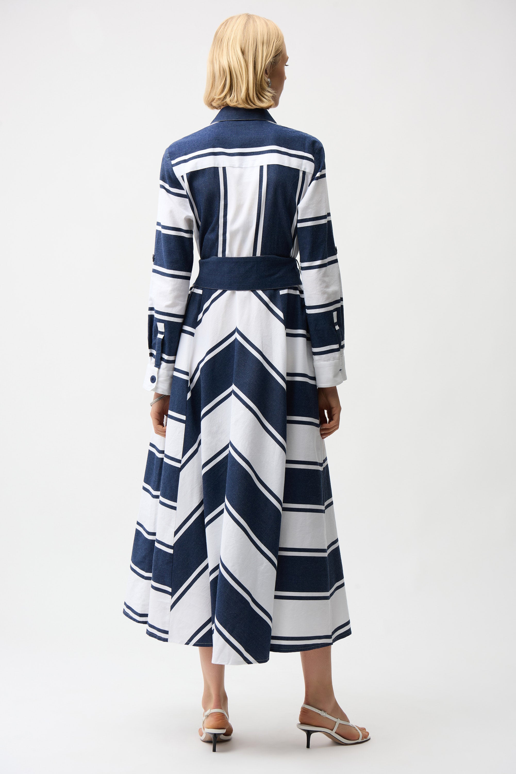 Back view of Striped Cotton Fit and Flare Maxi Dress showcasing navy and white stripes and three-quarter sleeves.