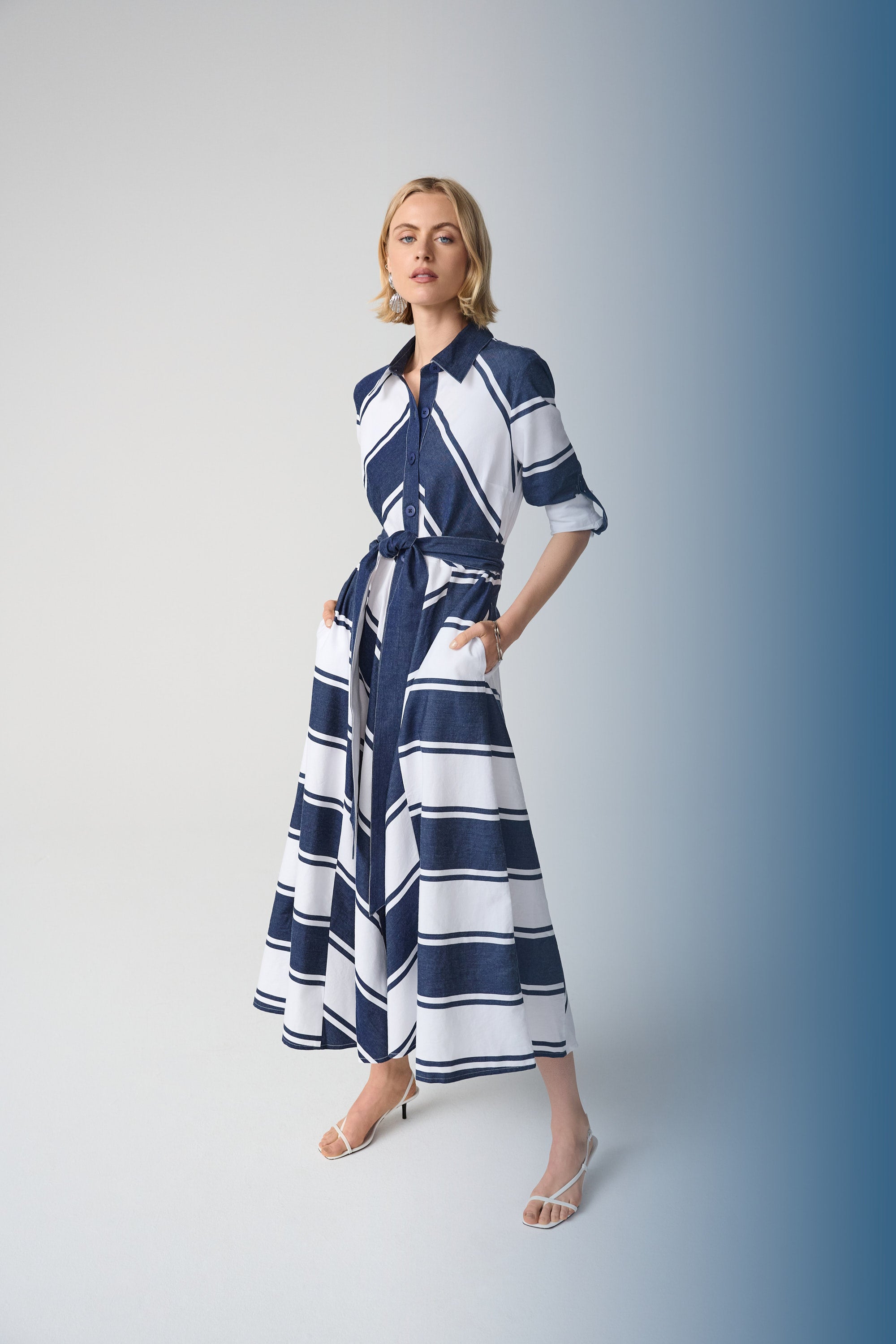 Striped Cotton Fit and Flare Maxi Dress worn by model, showcasing navy and white stripes with a collar and three-quarter sleeves.