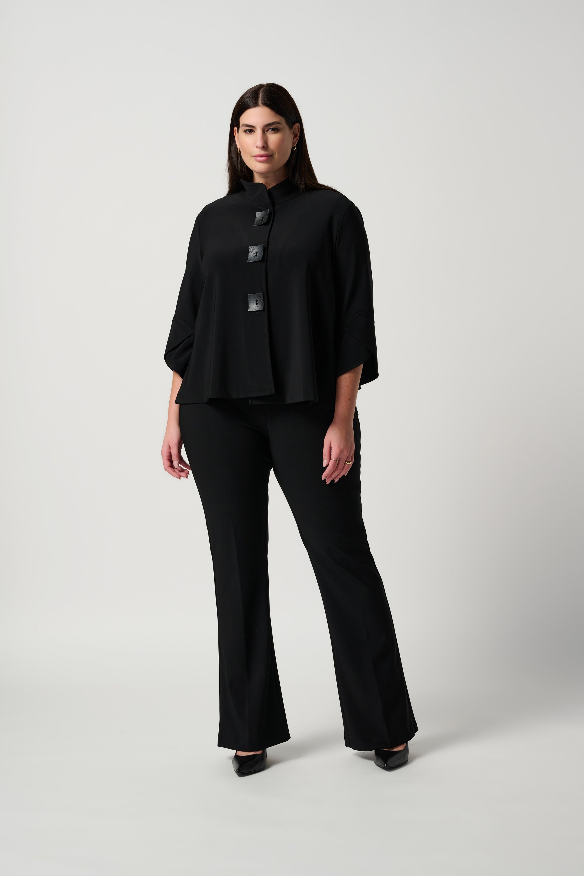 Black flare pants by Joseph Ribkoff on plus sized model