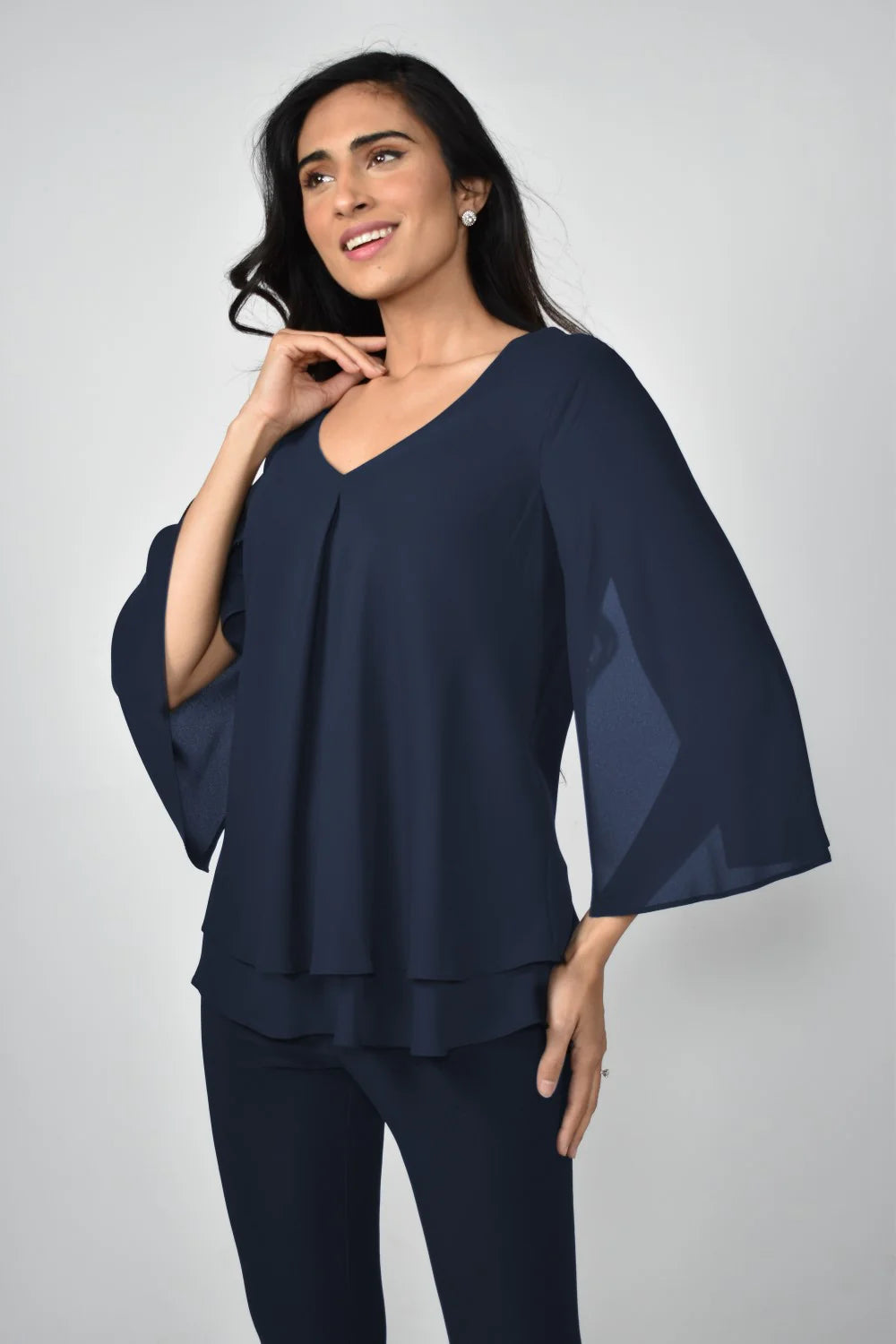Layered chiffon flounce sleeve top in navy, featuring a V-neckline and elegant flounce sleeves, perfect for refined styling.