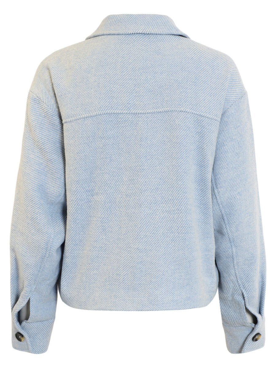 Back view of a wool-blend cropped jacket featuring a subtle herringbone texture and oversized buttons.