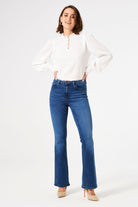 Women's mid-rise blue flare jeans with stretch denim, fitted through the hips and thighs with a flattering flared leg silhouette.