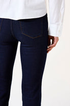 Mid-rise straight-leg denim jeans featuring classic back pockets and a streamlined fit through the leg.
