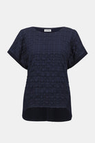 Navy short-sleeve textured top with a scoop neckline, front view on white background.