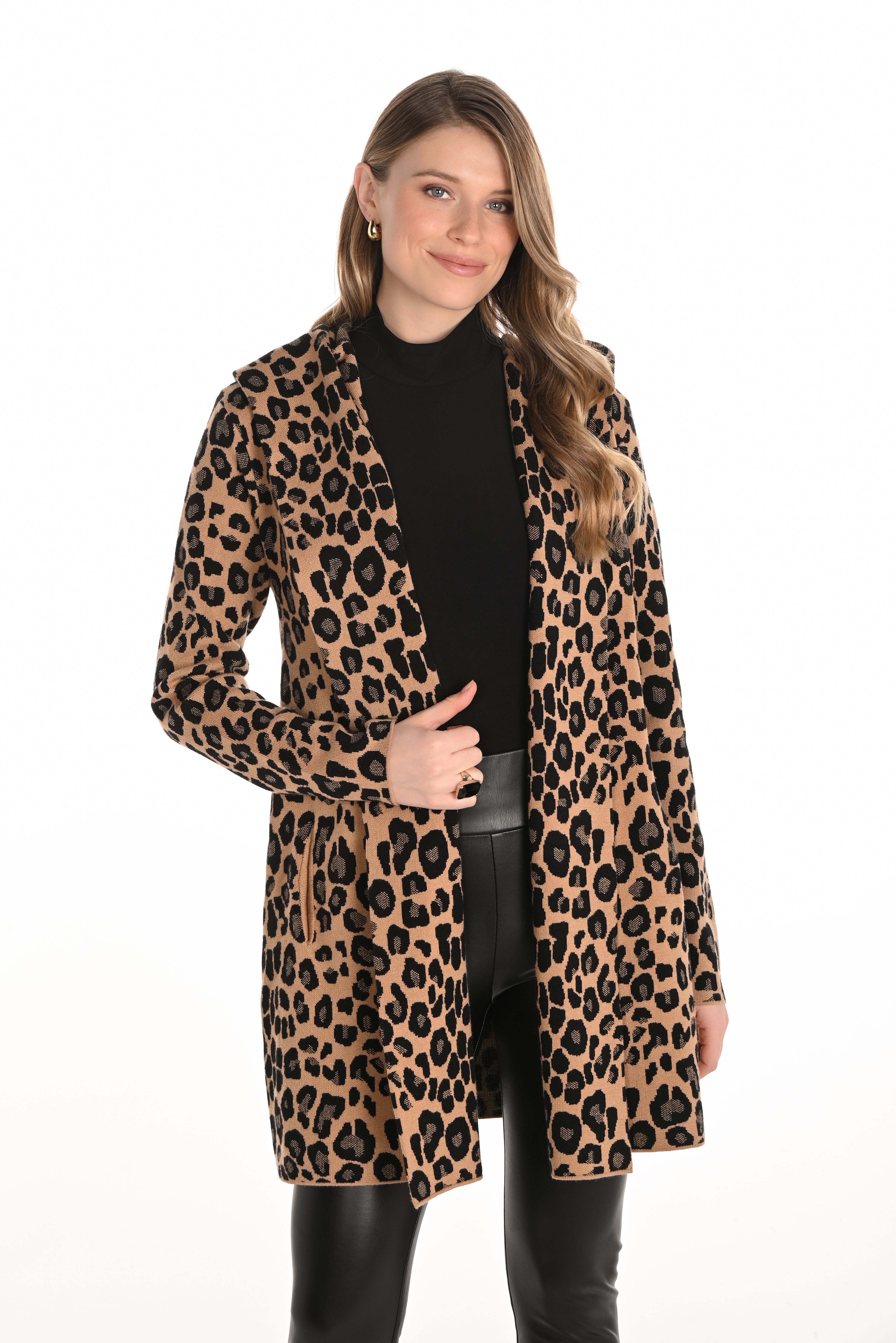 Woman wearing a leopard print coat on a white background