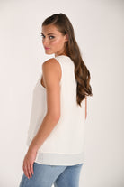 Side and back view of a sleeveless layered drape top featuring a relaxed silhouette, soft flowing fabric, and elegant layered detail.