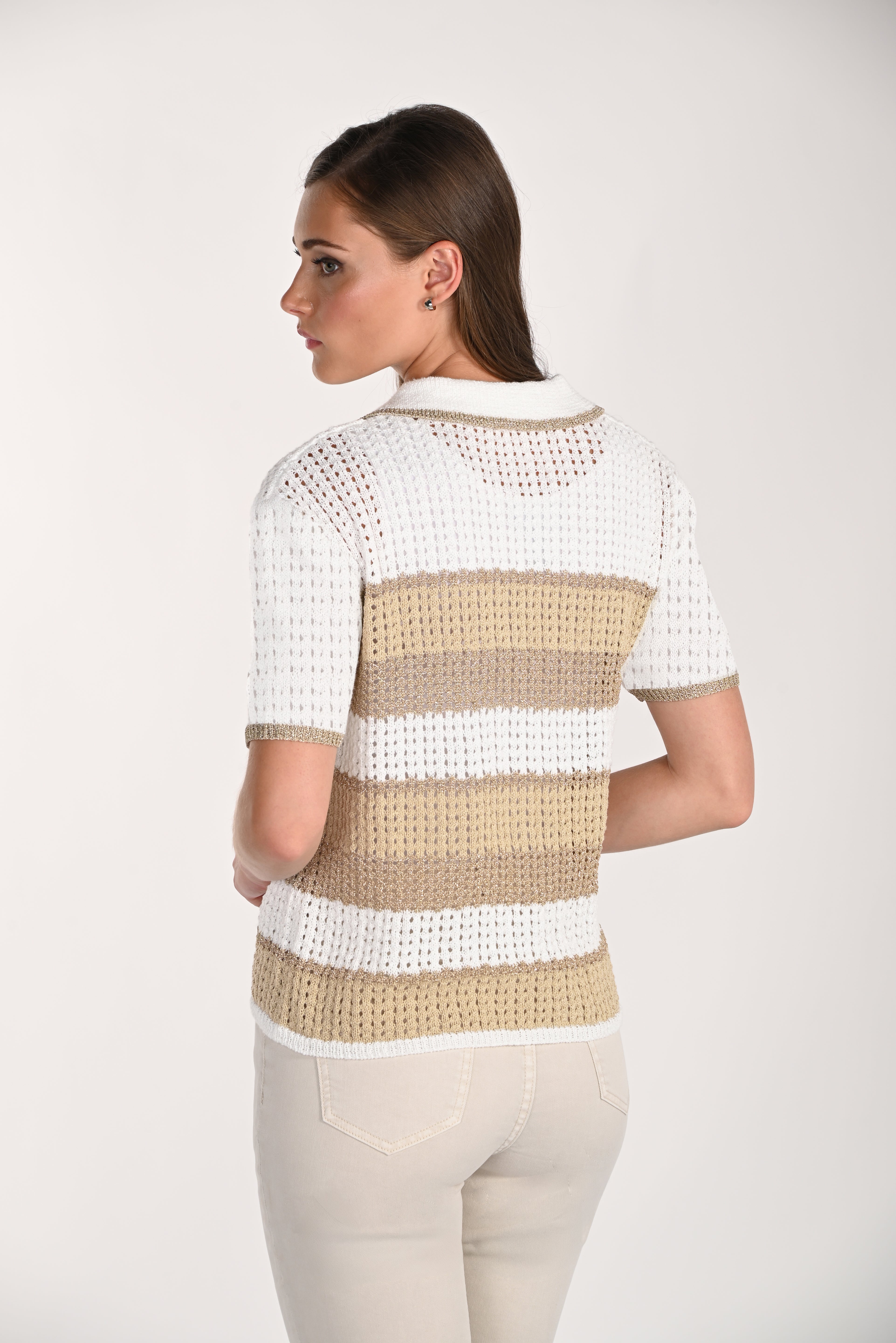 Women's white open-knit short-sleeve polo cardigan with beige and taupe horizontal stripes, shown from the back. Features a lightweight textured knit, ribbed trim, and a relaxed fit paired with cream pants.
