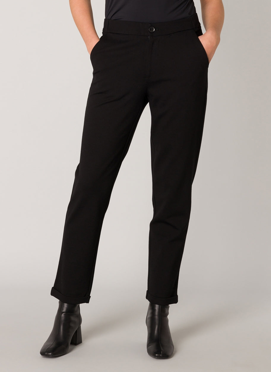 Women's tapered ankle pants with side pockets and cuffed hems, front view