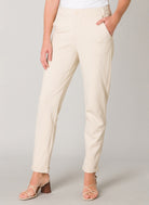 Women's tapered ankle pants with side pockets and cuffed hems, front view