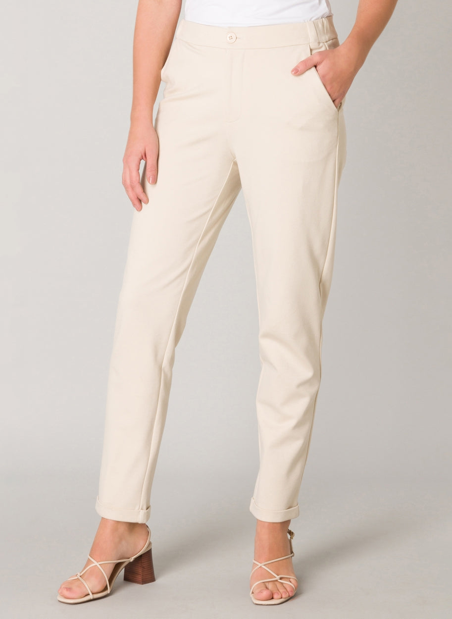 Women's tapered ankle pants with side pockets and cuffed hems, front view