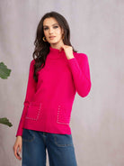 Woman wearing pink sweater