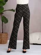 Plaid pants worn by a person with a neutral background