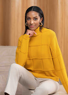Woman wearing amber sweater