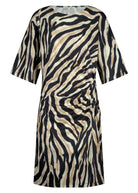 Zebra print dress on a white background
