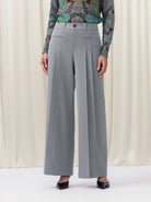 Woman wearing grey pants