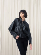 Woman wearing black jacket