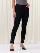 Woman wearing black pants