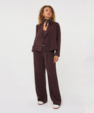 model wearing cacao wide-leg trousers 