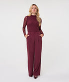 Model wearing merlot wide-leg trousers 