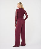 Model wearing merlot wide-leg trouser