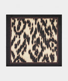 Square polyester scarf with an abstract animal-print pattern and contrasting border, displayed flat.
