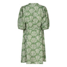 Back view of a green printed tie-waist day dress showing the all-over pattern, gathered sleeve detail, and lightly structured silhouette