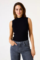 Close-up of a women's ribbed mock neck sleeveless knit top, highlighting the soft stretch texture, refined neckline, and figure-flattering fit. A versatile wardrobe staple designed for effortless styling.